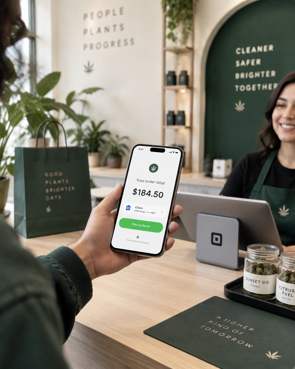 Customer paying by bank with Greencard at a dispensary counter